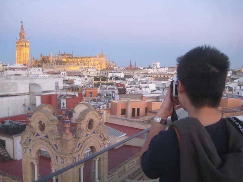 Seville: Sunset Roof Top Walking Tour - Hotel rooftops and Plaza snapshots: getting the angles between monuments