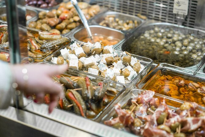 Seville: Triana Market Tapas Tour - Weather, walking, and who this is for
