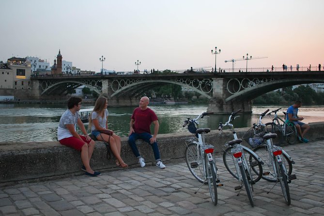 Sunset Guided Bike Tour in Seville - Stop-by-stop: Seville Cathedral exteriors and Santa Cruz’s medieval maze