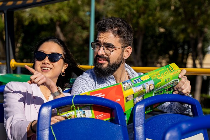 Tourist bus tour of Seville - Plaza de Cuba, Calle San Jacinto, and the bridge views