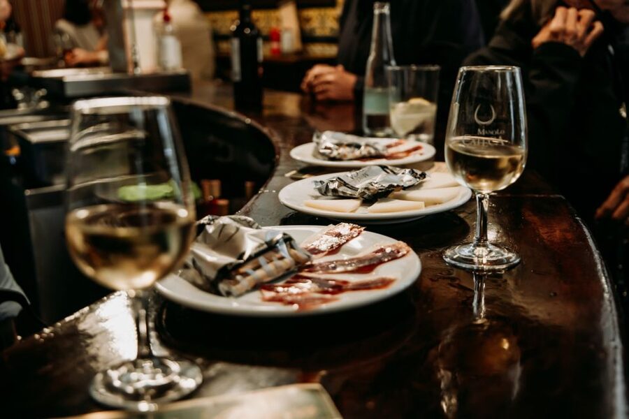Triana: Authentic Flamenco & Tapas Tour - The Abacería Stop: Manzanilla, Tapas, and a Quick Lesson in Neighborhood Shops
