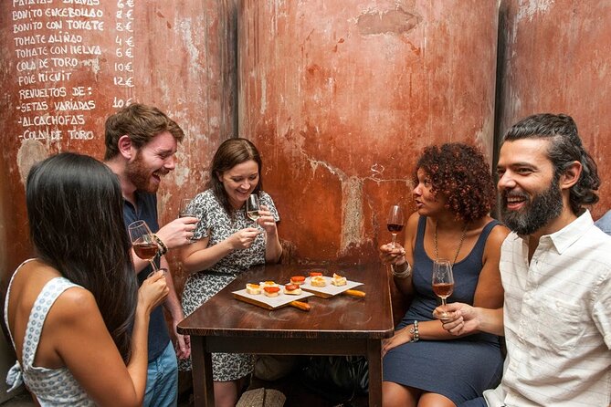 Ultimate Seville Tapas, Wine & History Small Group Tour - Seville at night: tapas, wine, and the Santa Cruz maze
